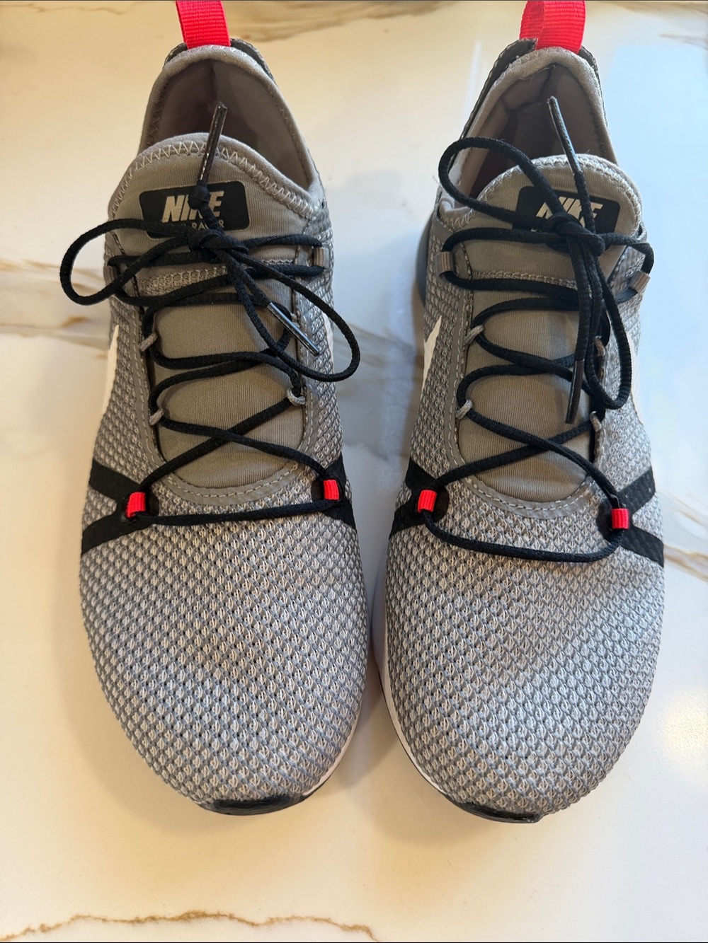 Nike Women’s Gray Knit Athletic Shoes with Black Laces and Red Tabs